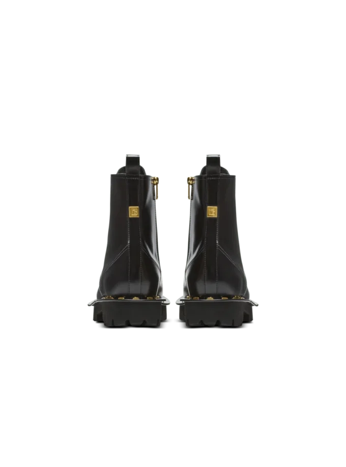 Arméboots i glansigt läder