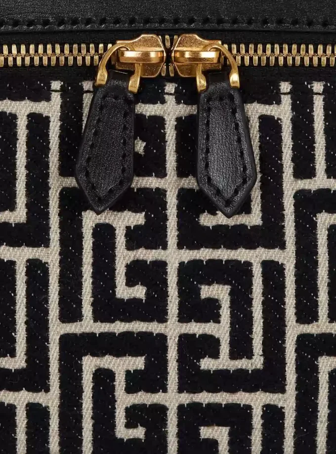 B-Army sminkväskan i monogrammerad canvas och läder B-Army sminkväskan i monogrammerad canvas och läder