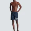 Badshorts med Balmain College-logotyp