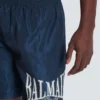 Badshorts med Balmain College-logotyp