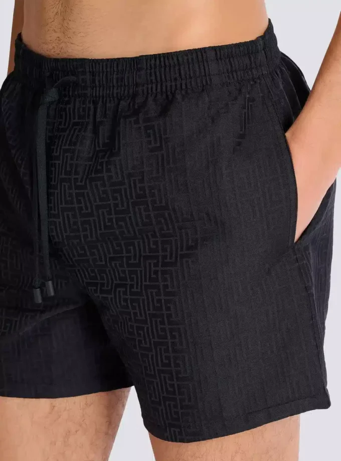 Badshorts med monogram Badshorts med monogram