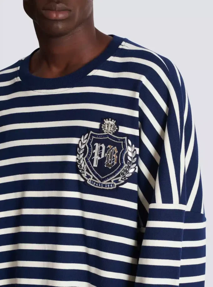 Bomullströja med collegeemblem och bretonska ränder