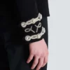 Crepe spencer-jacka med broderad frogging Crepe spencer-jacka med broderad frogging