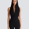 Drapad bodysuit med huva