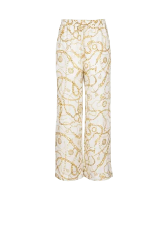 Flödande byxor i tryckt siden med Balmain Chains-mönster