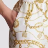 Flödande byxor i tryckt siden med Balmain Chains-mönster Flödande byxor i tryckt siden med Balmain Chains-mönster