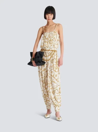 Flödande jumpsuit med tryck och Balmain Chains-mönster