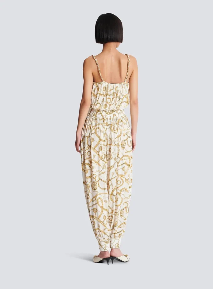 Flödande jumpsuit med tryck och Balmain Chains-mönster Flödande jumpsuit med tryck och Balmain Chains-mönster