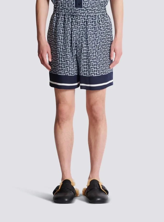 Flödande shorts med monogram