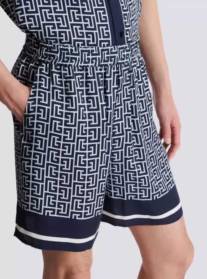 Flödande shorts med monogram