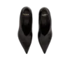 Glänsande kilklackade pumps i lammskinn