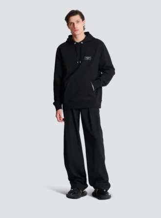 Huvtröja med Balmain Couture-etikett