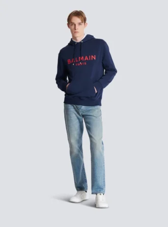 Huvtröja med tryck från Balmain Paris
