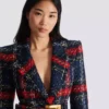 Kavaj i rutig tweed med bälte Kavaj i rutig tweed med bälte