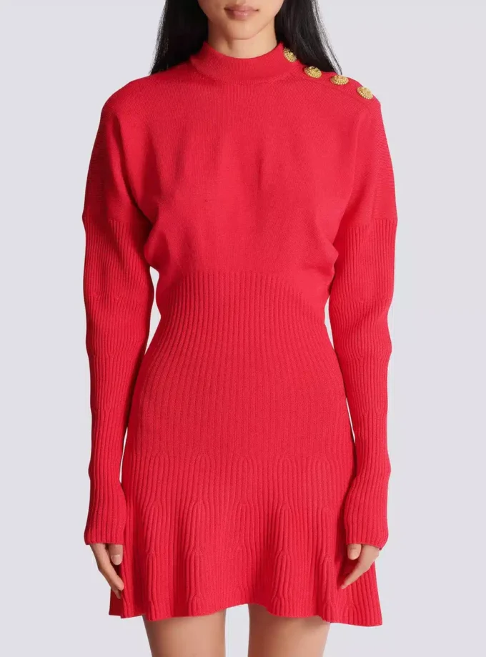 Kort utställd stickad klänning Kort utställd stickad klänning
