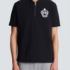Kortärmad polo med collegeemblem Kortärmad polo med collegeemblem