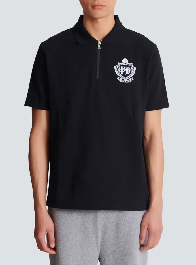 Kortärmad polo med collegeemblem Kortärmad polo med collegeemblem