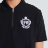 Kortärmad polo med collegeemblem Kortärmad polo med collegeemblem