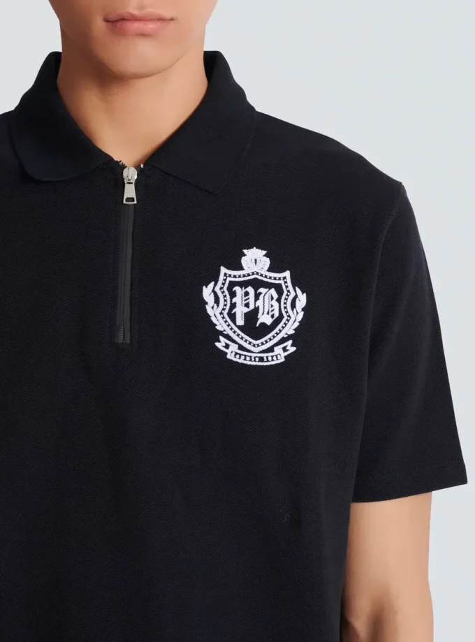 Kortärmad polo med collegeemblem Kortärmad polo med collegeemblem