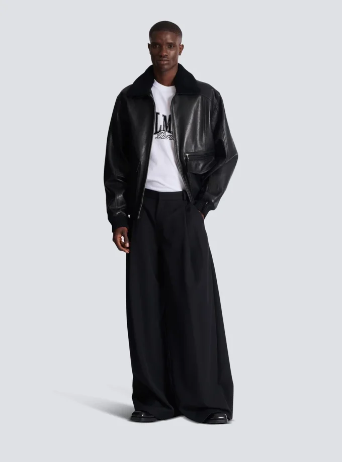 Kortärmad T-shirt med flockat Balmain College-tryck