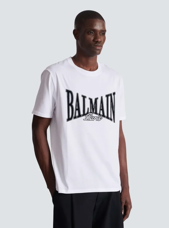 Kortärmad T-shirt med flockat Balmain College-tryck