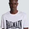 Kortärmad T-shirt med flockat Balmain College-tryck