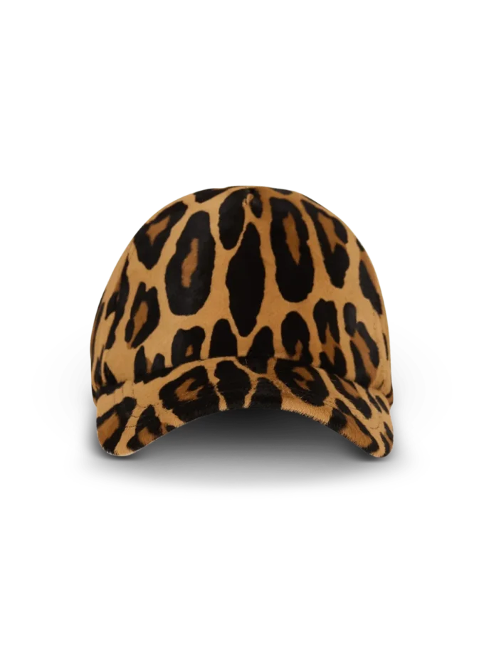 Läderkeps i ponnyhudstil med leopardmönster