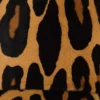 Läderkeps i ponnyhudstil med leopardmönster
