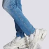 Låga sneakers i neopren och läder med enhörningsmotiv Låga sneakers i neopren och läder med enhörningsmotiv