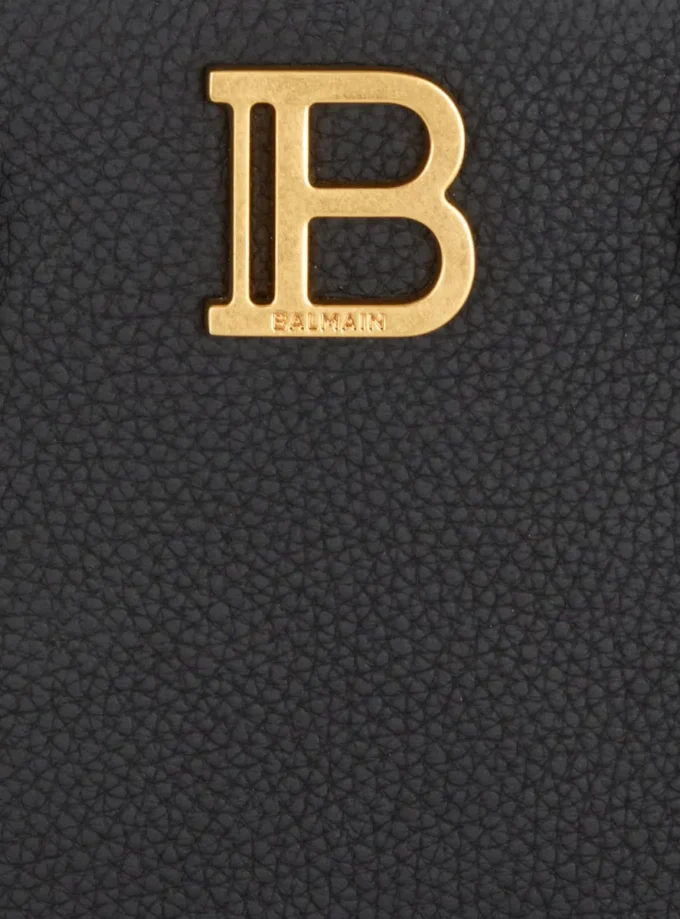 Liten B-Buzz-väska med handtag i kornat läder Liten B-Buzz-väska med handtag i kornat läder
