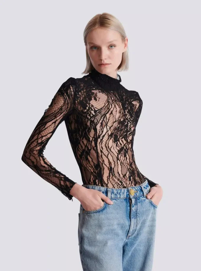 Långärmad body i spets Långärmad body i spets