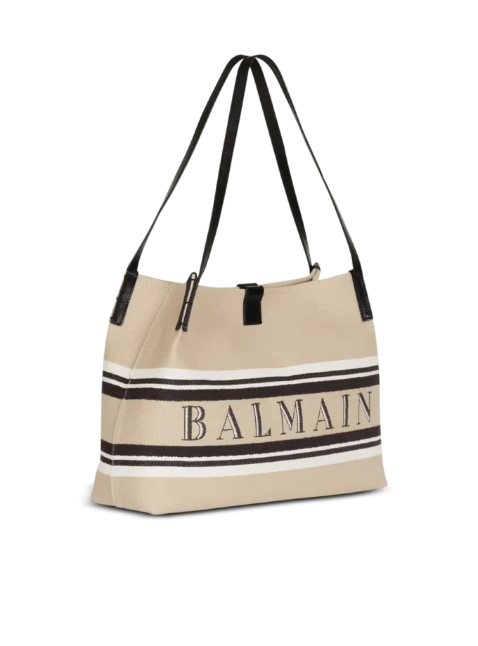 Medium Release Shopper-väska i canvas och kalvskinn Medium Release Shopper-väska i canvas och kalvskinn