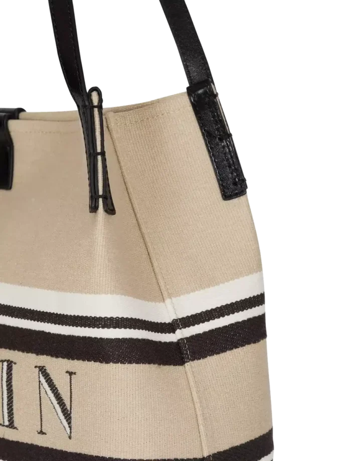 Medium Release Shopper-väska i canvas och kalvskinn Medium Release Shopper-väska i canvas och kalvskinn