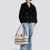 Medium Release Shopper-väska i canvas och kalvskinn Medium Release Shopper-väska i canvas och kalvskinn