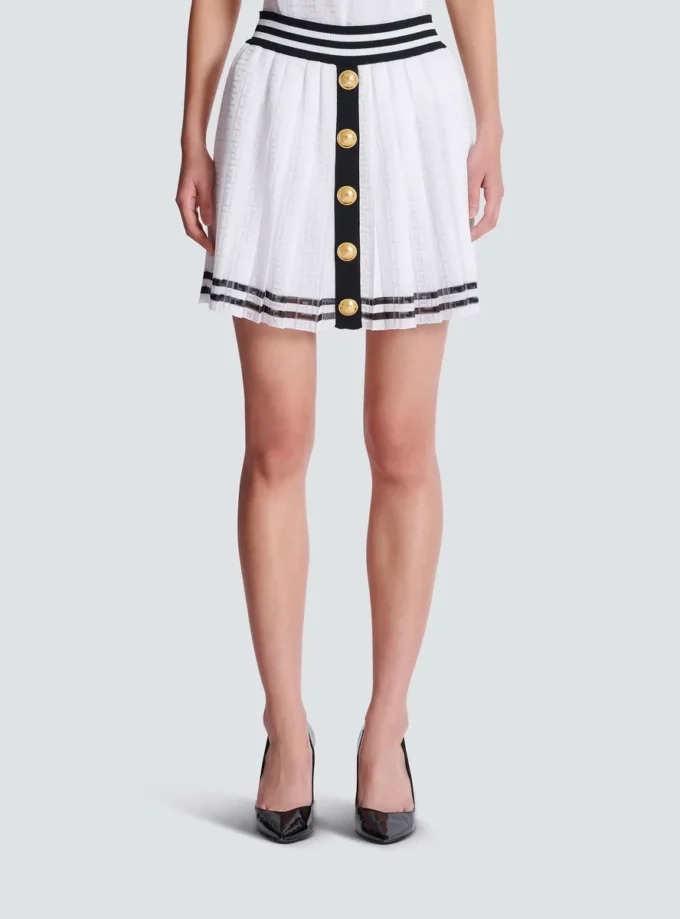 Plisserad stickad kjol med monogram Plisserad stickad kjol med monogram
