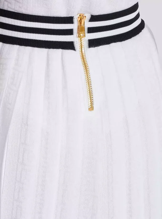 Plisserad stickad kjol med monogram Plisserad stickad kjol med monogram