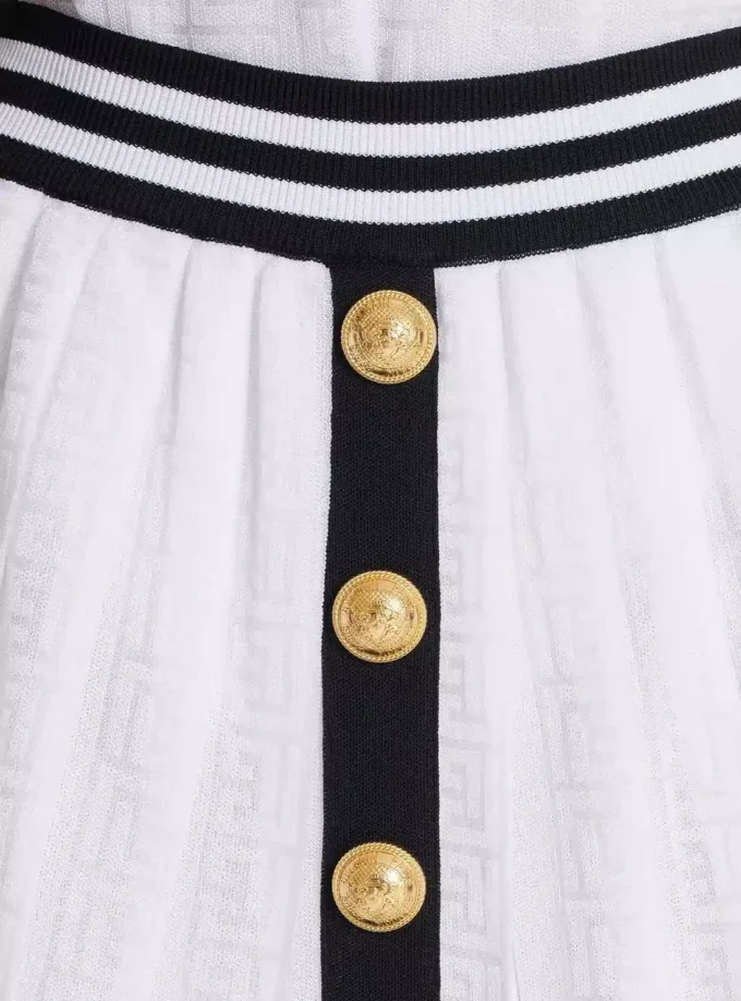 Plisserad stickad kjol med monogram Plisserad stickad kjol med monogram