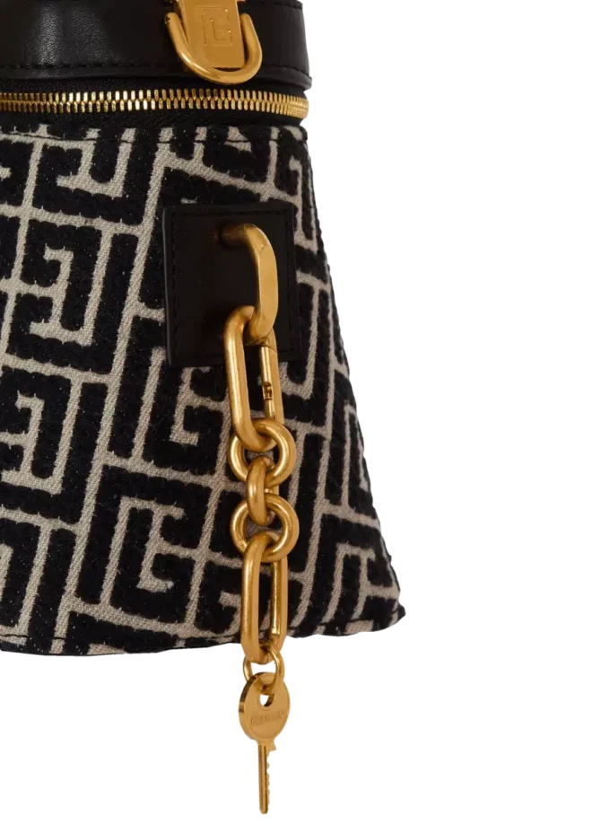 Pulse Vanity-väska i jacquardcanvas med monogram och läder