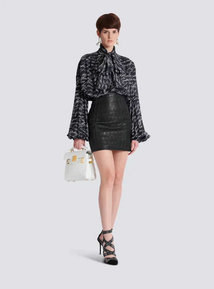 Quiltad lammskinnskjol med diamantmönster Quiltad lammskinnskjol med diamantmönster