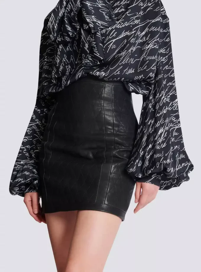 Quiltad lammskinnskjol med diamantmönster Quiltad lammskinnskjol med diamantmönster