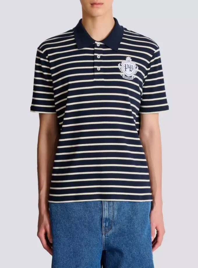Randig polo med collegeemblem Randig polo med collegeemblem