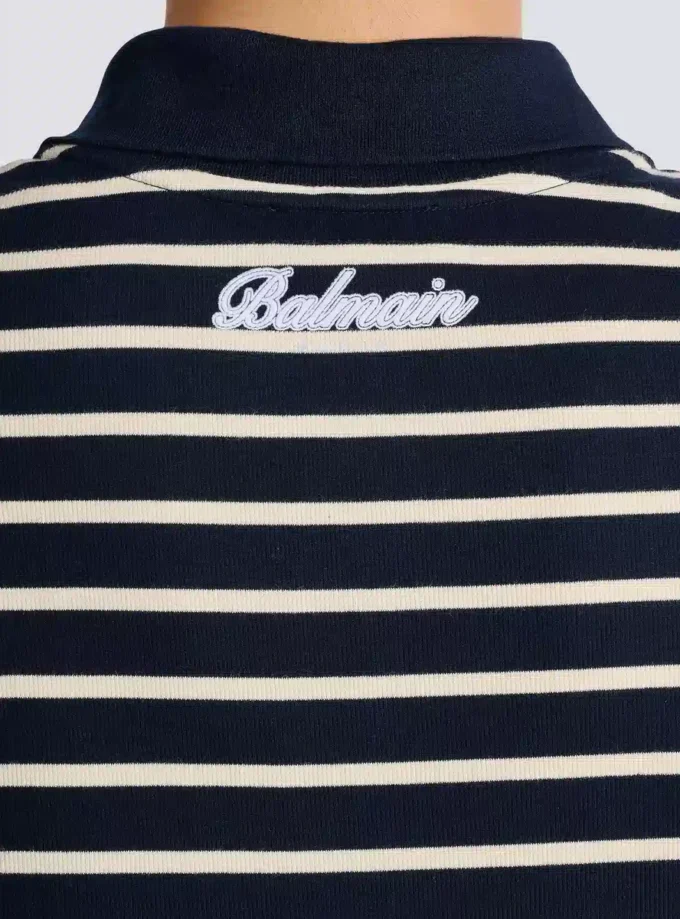 Randig polo med collegeemblem Randig polo med collegeemblem