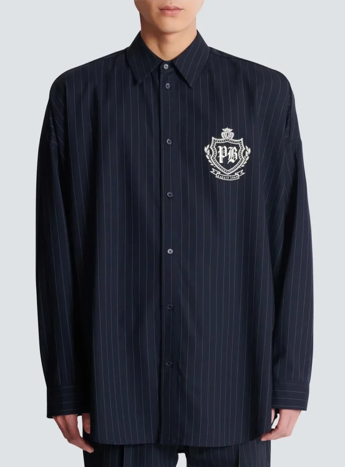 Randig ullskjorta med collegeemblem Randig ullskjorta med collegeemblem