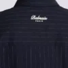 Randig ullskjorta med collegeemblem Randig ullskjorta med collegeemblem
