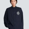 Randig ullskjorta med collegeemblem Randig ullskjorta med collegeemblem