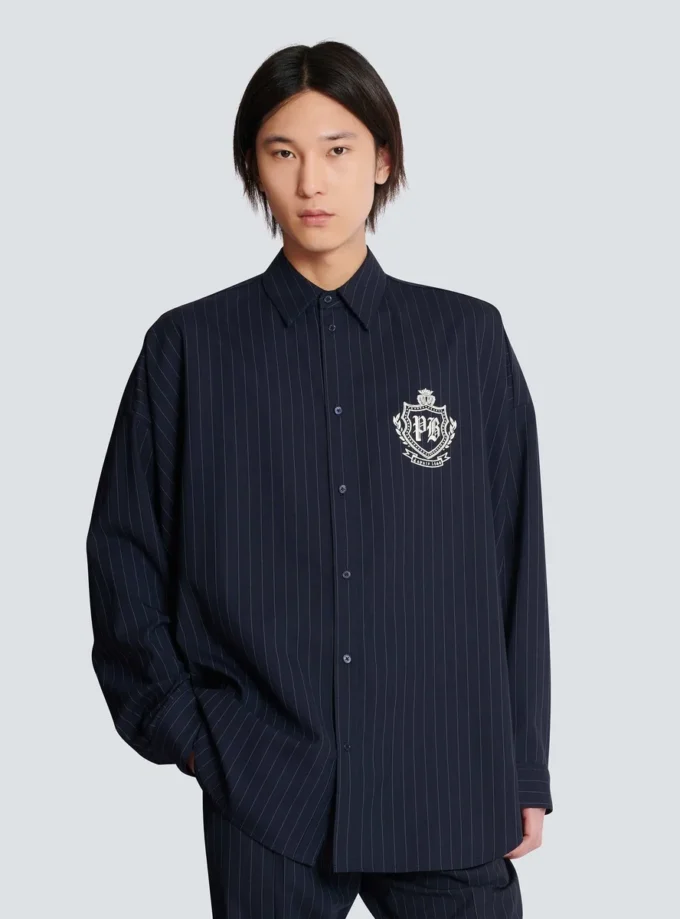 Randig ullskjorta med collegeemblem Randig ullskjorta med collegeemblem