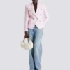 Sittande jacka i hundtandsmönstrad tweed med 6 knappar Sittande jacka i hundtandsmönstrad tweed med 6 knappar
