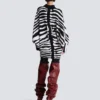 Stickad klänning med zebraintarsia