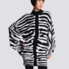Stickad klänning med zebraintarsia