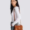 Suede B-Buzz Shoulder 24-väska Suede B-Buzz Shoulder 24-väska